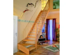 Dolle Wangentreppe Paris 1/4 gewendelt ohne Setzstufen Buche FSC